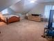 Spacious bedroom features a bed, sofa, tv and neutral decor at 15494 Donnington Dr, Charlotte, NC 28277