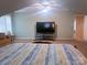 Spacious bedroom offering a bed, sitting area, and television at 15494 Donnington Dr, Charlotte, NC 28277