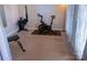 Well-equipped exercise room with an exercise bike and free weights for a complete workout at 15494 Donnington Dr, Charlotte, NC 28277
