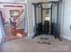Home gym featuring a complete weight machine, perfect for staying in shape at 15494 Donnington Dr, Charlotte, NC 28277