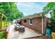 Expansive outdoor patio area perfect for entertaining with seating, grill, and convenient home access at 1571 10Th Street Nw Pl, Hickory, NC 28601