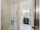 Elegant bathroom featuring a glass-enclosed shower and a stylish vanity with modern fixtures at 1625 Club Rd, Charlotte, NC 28205