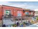 View of a red brick building with a brewery sign and outdoor seating area at 1720 Chatham Ave, Charlotte, NC 28205