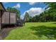 Picturesque backyard view with deck and lush green lawn at 1761 Arden Dr, Lincolnton, NC 28092