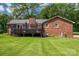 Large backyard with a deck, perfect for entertaining and relaxation at 1761 Arden Dr, Lincolnton, NC 28092