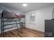 Childs room featuring loft bed with a ladder, and hardwood floors at 1761 Arden Dr, Lincolnton, NC 28092