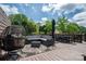 Relaxing outdoor deck with stylish patio furniture and decorative rug at 1761 Arden Dr, Lincolnton, NC 28092