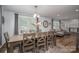 Bright dining area with a large wooden table, perfect for Gathering gatherings at 1761 Arden Dr, Lincolnton, NC 28092