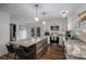 Stylish kitchen featuring a center island, stainless steel appliances, and white cabinetry at 1761 Arden Dr, Lincolnton, NC 28092