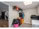 Finished storage area with gray tile flooring, barn door, and built-in shelving units at 1761 Arden Dr, Lincolnton, NC 28092