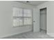 Bedroom with plush carpet, neutral walls, a window with blinds, and a closet at 1890 Sandal Brook Rd, Fort Mill, SC 29707