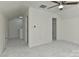 Spacious bedroom with a ceiling fan and neutral carpet and paint at 1890 Sandal Brook Rd, Fort Mill, SC 29707