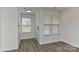 Bright, airy living room with new hardwood flooring, lots of light and fresh paint at 1890 Sandal Brook Rd, Fort Mill, SC 29707
