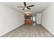 Spacious open-concept living area with sleek flooring and seamless flow to the kitchen at 1890 Sandal Brook Rd, Fort Mill, SC 29707
