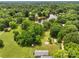 Aerial view of the property showcasing a house with a large yard and a tranquil lake at 2021 Beamguard Rd, Clover, SC 29710