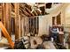 Image shows damage to the interior of a home, under renovation at 2308 Vanderbilt Rd, Charlotte, NC 28206