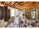 Interior shot of a room showing a washer dryer and unfinished walls indicating a renovation project at 2308 Vanderbilt Rd, Charlotte, NC 28206