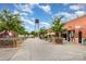 Street view of outdoor dining at a community center or market with a water tower in the distance at 2308 Vanderbilt Rd, Charlotte, NC 28206