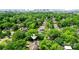 Aerial view showing the property amidst lush trees, conveniently located near the city skyline at 2412 Chesterfield Ave, Charlotte, NC 28205