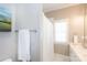 Bathroom with vanity, tile floor and shower with white curtain at 2412 Chesterfield Ave, Charlotte, NC 28205
