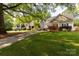 Charming home with a well-manicured lawn and inviting curb appeal in a desirable neighborhood at 2412 Chesterfield Ave, Charlotte, NC 28205