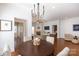 Bright and open living room and dining area with dark wood floors and lots of natural light at 2412 Chesterfield Ave, Charlotte, NC 28205