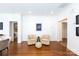 Elegant living room with hardwood floors, detailed trim, and neutral decor, creating a welcoming atmosphere at 2412 Chesterfield Ave, Charlotte, NC 28205
