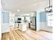 Bright kitchen featuring white cabinets, quartz countertops and stainless steel appliances at 251 Hall Nw Ave, Concord, NC 28027