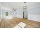 Bright living room with hardwood floors and stylish wainscoting at 251 Hall Nw Ave, Concord, NC 28027