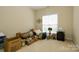 Spare bedroom with natural light. Some clutter at 2598 Old Ashworth Nw Ln, Concord, NC 28027