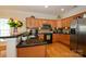 Charming kitchen features granite countertops, stainless steel appliances, and wood cabinetry at 2598 Old Ashworth Nw Ln, Concord, NC 28027