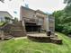 Large backyard featuring a multi-level deck, screened porch, patio, fire pit, and grill at 2652 Bedford Nw Pl, Concord, NC 28027