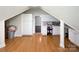 Finished bonus room with wood floors, white cabinets and countertops offering versatile space at 2652 Bedford Nw Pl, Concord, NC 28027