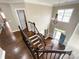 Grand 2-story foyer with hardwood staircase, iron railings, and decorative chandelier at 2652 Bedford Nw Pl, Concord, NC 28027