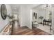 Elegant entryway featuring hardwood floors and views into the adjacent living spaces at 3004 Marlowe Ave, Charlotte, NC 28208