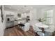 Modern kitchen with stainless steel appliances, granite countertops, and a breakfast bar at 3004 Marlowe Ave, Charlotte, NC 28208