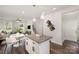 Open kitchen and living area combination, with island and breakfast nook at 3004 Marlowe Ave, Charlotte, NC 28208