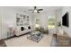 Bright and airy living room showcasing modern decor and large windows at 3004 Marlowe Ave, Charlotte, NC 28208