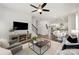 Open-concept living room seamlessly flows into the kitchen, ideal for entertaining at 3004 Marlowe Ave, Charlotte, NC 28208
