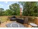 Spacious back deck features outdoor seating and wooded views at 416 Dalton Cir, Fort Mill, SC 29715