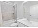 Bathroom with tiled shower-tub combination and quartz countertop vanity at 416 Dalton Cir, Fort Mill, SC 29715