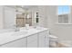 Bathroom with a double sink vanity, modern fixtures, and walk-in shower at 416 Dalton Cir, Fort Mill, SC 29715