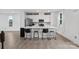 Contemporary kitchen showcases a spacious island with seating, stainless steel appliances, and light wood floors at 416 Dalton Cir, Fort Mill, SC 29715
