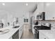 Well-lit kitchen features a spacious island, stainless steel appliances, and an open layout at 416 Dalton Cir, Fort Mill, SC 29715