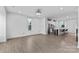 Spacious living room with modern flooring, kitchen island, and ample natural light at 416 Dalton Cir, Fort Mill, SC 29715