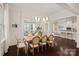Open-concept dining room flows seamlessly into the living room and kitchen, perfect for entertaining at 4311 Sheffield Park Ave, Charlotte, NC 28211