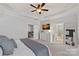 Spacious main bedroom features tray ceilings, an ensuite bathroom, and access to the upstairs landing at 4311 Sheffield Park Ave, Charlotte, NC 28211