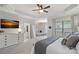 Spacious main bedroom includes sitting area, ensuite bathroom and sunset views from the television at 4311 Sheffield Park Ave, Charlotte, NC 28211