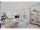 Bright office space with a large window, stylish decor, and ample workspace at 4311 Sheffield Park Ave, Charlotte, NC 28211