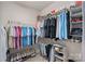 Organized walk-in closet featuring wire shelving and clothing racks for ample storage space at 4311 Sheffield Park Ave, Charlotte, NC 28211
